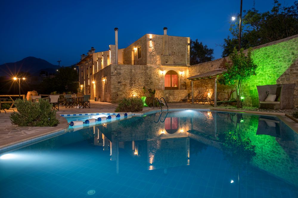 villa and pool at night